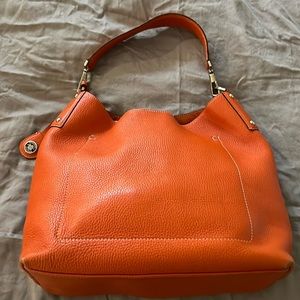 Dooney & Burke pebbled leather shoulder bag. Good condition, cloth bag included.